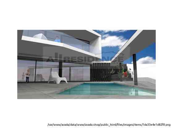 Роскошная вилла с современной архитектурой и видом на море Фару