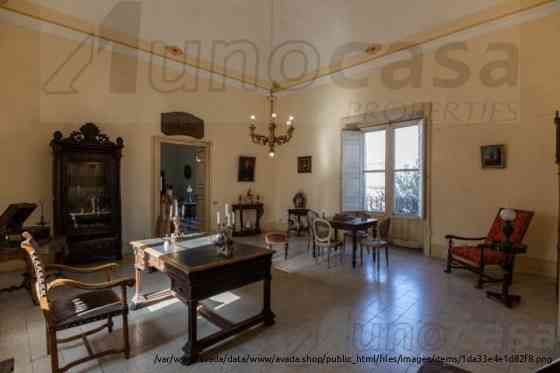 Продается элегантная укрепленная резиденция в Комизо Сицилия Катания