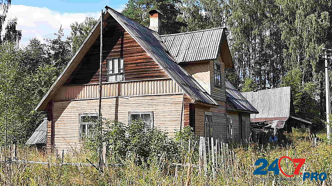 Добротный большой дом на участке 1 гектар рядом с красивым озером Псков - изображение 1