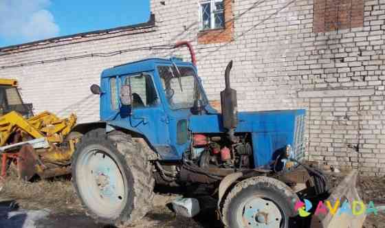Трактор с прицепом Вологда