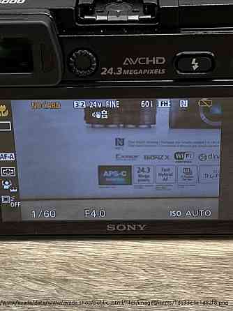 Sony Alpha а6000 цифровая фотокамера с 16-мм и 55-210мм линзами Moscow